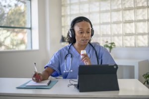 The 28 Most In-Demand Nursing Jobs of 2022 - a picture of a telehealth nurse.