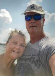 Sandra Tripp with her father at the lake