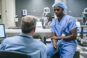 Conflict Resolution in Nursing: 2 nurses talking with each other