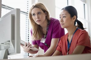 Conflict Resolution in Nursing- picture of two nurses working together