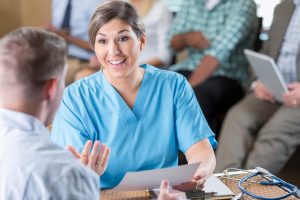 Nursing Resume Do's and Don'ts: How to Craft a Strong Resume - a picture of a nurse going over her resume