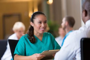 Nursing Resume Do's and Don'ts: How to Craft a Strong Resume - a picture of a nurse interviewing for a job.