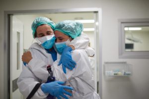 20 Things to Know a picture of a nurses consoling each other