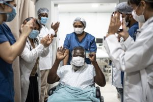 Life As A Nurse - a picture of a medical team celebrating a patient