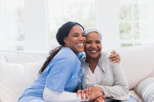 Why Become A Nurse - a picture of a nurse hugging her patient