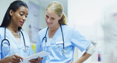 Float Pool nurse- a picture of two nurses talking.