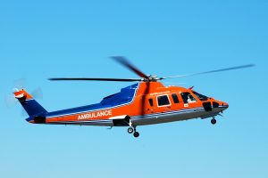 Flight nurse - a picture of an ambulatory helicopter in flight.